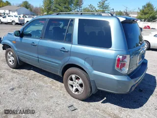2006 Honda Pilot EX-L with RES with VIN 2HKYF18626H505792, listed as a IAAI auction lot 41861686 with 180,551 mi miles. Bid and sale history available at carsss.com. Image 3.