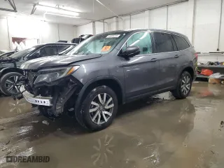 2019 Honda Pilot EX-L with VIN 5FNYF6H57KB038429, listed as a Copart auction lot 48065215 with 98,641 mi miles and Salvage Title. Bid and sale history available at carsss.com. Image 1.