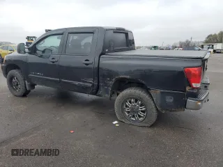 2014 Nissan Titan Pro-4X with VIN 1N6AA0EC3EN514744, listed as a Copart auction lot 80469314 with 191,780 mi miles and Salvage title. Bid and sale history available at DreamBid. Image 2.