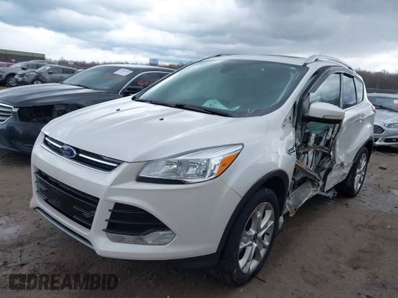 2016 Ford Escape Titanium with VIN 1FMCU9JX9GUA62674, listed as a IAAI auction lot 41838996 with 135,105 mi miles. Bid and sale history available at carsss.com. Image 2.