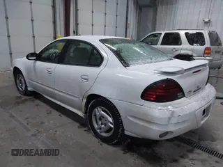 2005 Pontiac Grand Am SE with VIN 1G2NE52E75M198223, listed as a IAAI auction lot 41310937 with 100,889 mi miles. Bid and sale history available at carsss.com. Image 3.