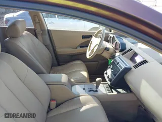 2004 Nissan Murano SE with VIN JN8AZ08W24W307566, listed as a IAAI auction lot 41809579 with 118,114 mi miles. Bid and sale history available at carsss.com. Image 5.