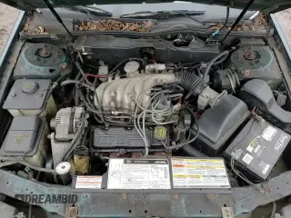1995 Ford Taurus GL z VIN 1FALP52U1SA108202, wystawiony jako Copart lot #85676434 z przebiegiem 102 669 mil mil oraz Szkoda całkowita • Salvage title. Historia ofert i sprzedaży dostępna na DreamBid. Obrazek 13.