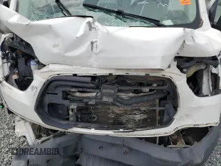 2018 Ford Transit with VIN 1FTYE1CM6JKA35821, listed as a Copart auction lot 53590534 with 82,324 mi miles and Salvage Title. Bid and sale history available at DreamBid. Image 13.