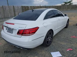 2014 Mercedes-Benz E 350 with VIN WDDKJ8JB7EF258210, listed as a IAAI auction lot 42632492 with 127,556 mi miles and . Bid and sale history available at DreamBid. Image 4.