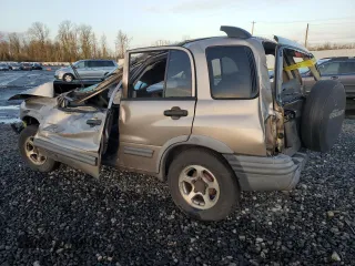 2003 Chevrolet Tracker ZR2 z VIN 2CNBJ734736913357, wystawiony jako Copart lot #86546884 z przebiegiem Nie podano mil oraz Nie do naprawy • Non repairable. Historia ofert i sprzedaży dostępna na DreamBid. Obrazek 2.