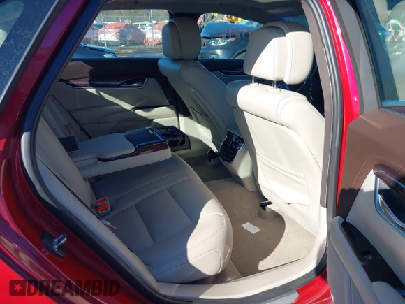 2014 Cadillac XTS Luxury z VIN 2G61N5S34E9163874, wystawiony jako IAAI lot #41649292 z przebiegiem 104 638 mil mil oraz . Historia ofert i sprzedaży dostępna na DreamBid. Obrazek 8.
