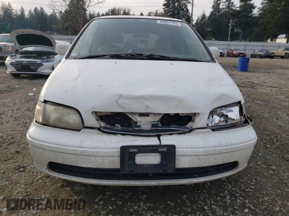1998 Honda Odyssey with VIN RA31038664, listed as a Copart auction lot 43051785 with 106,084 mi miles and Salvage title. Bid and sale history available at DreamBid. Image 5.
