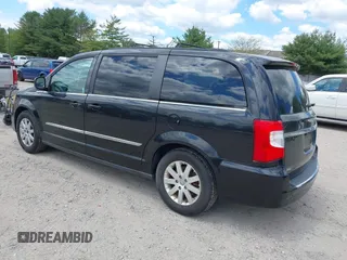 2014 Chrysler Town & Country Touring with VIN 2C4RC1BG2ER206979, listed as a IAAI auction lot 42200266 with 217,610 mi miles and . Bid and sale history available at DreamBid. Image 3.