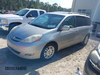 2010 Toyota Sienna XLE with VIN 5TDYK4CC9AS319809, listed as a IAAI auction lot 41885905 with 252,010 mi miles and . Bid and sale history available at DreamBid. Image 2.