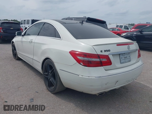 2012 Mercedes-Benz E 350 with VIN WDDKJ5KB4CF130789, listed as a IAAI auction lot 42083917 with 174,189 mi miles and . Bid and sale history available at DreamBid. Image 3.
