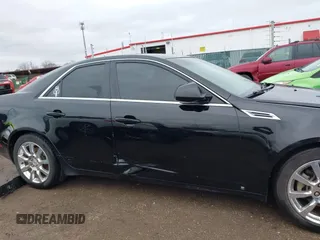 2008 Cadillac CTS RWD w/1SB with VIN 1G6DR57V580176739, listed as a IAAI auction lot 41847461 with 136,482 mi miles. Bid and sale history available at carsss.com. Image 13.