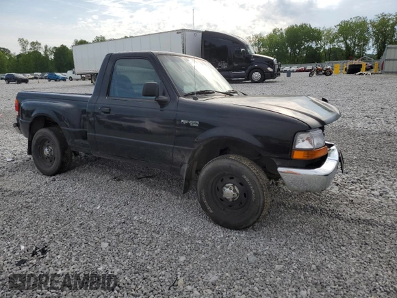 1999 Ford Ranger XL with VIN 1FTYR10C1XPB36812, listed as a Copart auction lot 54751214 with 277,416 mi miles and Salvage title. Bid and sale history available at DreamBid. Image 4.