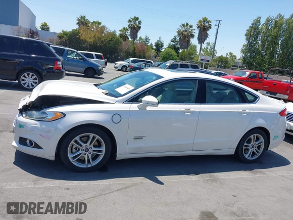 2016 Ford Fusion Titanium z VIN 3FA6P0SU1GR116118, wystawiony jako IAAI lot #42685489 z przebiegiem 138 690 mil mil oraz . Historia ofert i sprzedaży dostępna na DreamBid. Obrazek 14.