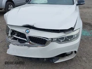 2014 BMW 4 Series 428i z VIN WBA3N3C5XEF711746, wystawiony jako IAAI lot #42215565 z przebiegiem 113 941 mil mil oraz . Historia ofert i sprzedaży dostępna na DreamBid. Obrazek 6.