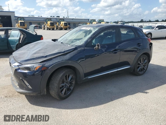 2018 Mazda CX-3 Grand Touring z VIN JM1DKFD79J0329416, wystawiony jako Copart lot #51708325 z przebiegiem 64 597 mil mil oraz Szkody całkowita. Historia ofert i sprzedaży dostępna na DreamBid. Obrazek 1.