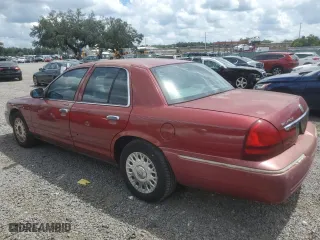 2003 Mercury Grand Marquis GS Convenience with VIN 2MEFM74W73X704870, listed as a Copart auction lot 71243934 with 120,807 mi miles and Salvage Title. Bid and sale history available at carsss.com. Image 2.