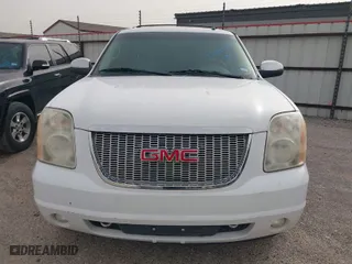 2009 GMC Yukon SLT w/4SB with VIN 1GKFC33009R149228, listed as a IAAI auction lot 41709590 with 212,227 mi miles. Bid and sale history available at carsss.com. Image 12.