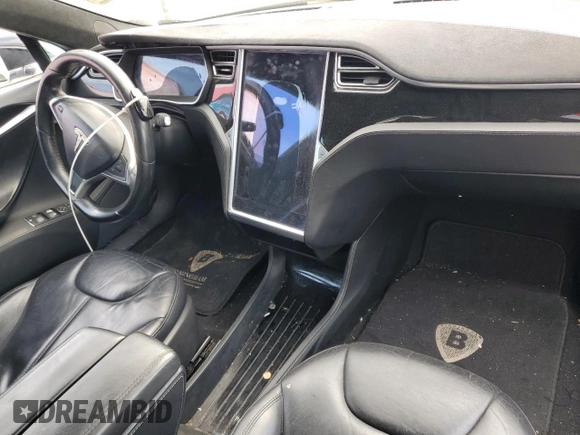 2014 Tesla Model S 60 z VIN 5YJSA1H12EFP62263, wystawiony jako Copart lot #63258675 z przebiegiem Nie podano mil oraz Czysty tytuł • Clean title. Historia ofert i sprzedaży dostępna na DreamBid. Obrazek 8.