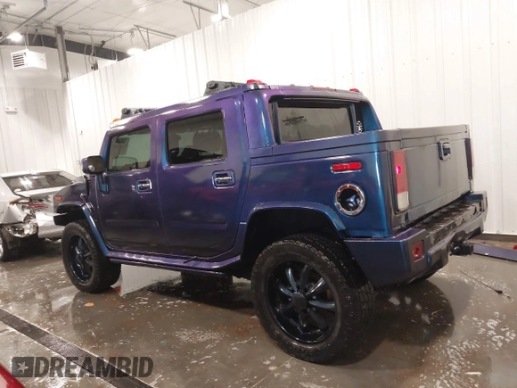 2006 Hummer H2 z VIN 5GRGN22U06H103603, wystawiony jako IAAI lot #41992767 z przebiegiem 165 782 mil mil oraz . Historia ofert i sprzedaży dostępna na DreamBid. Obrazek 15.