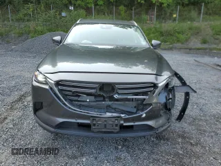 2021 Mazda CX-9 Touring with VIN JM3TCBCY6M0512571, listed as a Copart auction lot 59417475 with 37,865 mi miles and Salvage title. Bid and sale history available at DreamBid. Image 5.