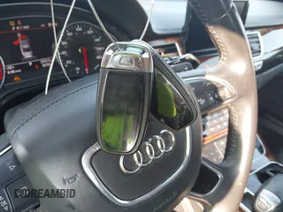 2013 Audi A8 3.0L с VIN WAURGAFD7DN016351, выставлен на аукционе IAAI как лот 42372202 с пробегом 90 753 миль миль и . История ставок и продаж доступна на DreamBid. Изображение 11.