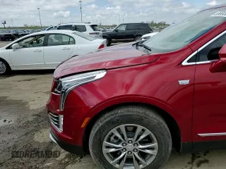 2023 Cadillac XT5 FWD Premium Luxury z VIN 1GYKNCRS5PZ173528, wystawiony jako Copart lot #55805605 z przebiegiem 7 789 mil mil oraz Szkoda całkowita • Salvage title. Historia ofert i sprzedaży dostępna na DreamBid. Obrazek 14.