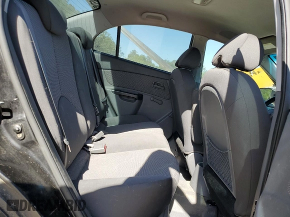 2011 Kia Rio LX with VIN KNADH4A31B6749736, listed as a Copart auction lot 53128685 with 103,392 mi miles and Clean Title. Bid and sale history available at carsss.com. Image 10.