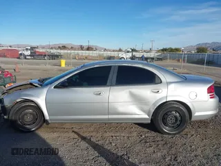 2005 Dodge Stratus SXT z VIN 1B3EL46T65N612205, wystawiony jako IAAI lot #41406828 z przebiegiem 155 314 mil mil oraz . Historia ofert i sprzedaży dostępna na DreamBid. Obrazek 14.