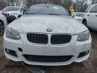 2011 BMW 3 Series 335i with VIN WBADX7C51BE742780, listed as a IAAI auction lot 41636961 with Not Provided miles and . Bid and sale history available at carsss.com. Image 11.