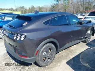 2021 Ford Mustang Mach-E Select z VIN 3FMTK1RM7MMA52193, wystawiony jako IAAI lot #41591356 z przebiegiem 48 522 mil mil oraz . Historia ofert i sprzedaży dostępna na DreamBid. Obrazek 4.