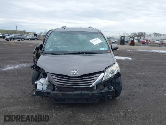 2015 Toyota Sienna LE AAS with VIN 5TDKK3DC1FS615090, listed as a IAAI auction lot 41965112 with 116,745 mi miles. Bid and sale history available at carsss.com. Image 12.