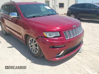 2014 Jeep Grand Cherokee Summit with VIN 1C4RJFJT1EC237358, listed as a IAAI auction lot 42602245 with 106,821 mi miles and . Bid and sale history available at DreamBid. Image 6.