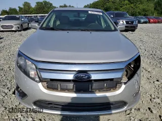 2010 Ford Fusion Hybrid z VIN 3FADP0L31AR150886, wystawiony jako Copart lot #57517255 z przebiegiem 170 137 mil mil oraz Szkoda całkowita • Salvage title. Historia ofert i sprzedaży dostępna na DreamBid. Obrazek 5.