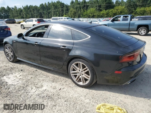 2016 Audi A7 3.0 Premium Plus with VIN WAUWGAFCXGN036902, listed as a Copart auction lot 64341993 with 82,725 mi miles. Bid and sale history available at carsss.com. Image 2.