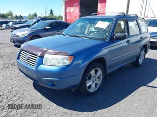 2007 Subaru Forester X with VIN JF1SG63617H711280, listed as a IAAI auction lot 42848599 with 158,667 mi miles and . Bid and sale history available at DreamBid. Image 2.