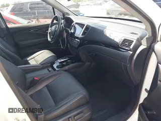 2017 Honda Pilot Touring with VIN 5FNYF6H92HB054145, listed as a IAAI auction lot 42200391 with 70,096 mi miles and . Bid and sale history available at DreamBid. Image 5.