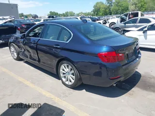 2016 BMW 5 Series 535i xDrive with VIN WBA5B3C59GG256290, listed as a IAAI auction lot 42381402 with 82,299 mi miles and . Bid and sale history available at DreamBid. Image 3.