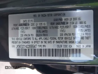 2016 Mazda CX-5 Touring with VIN JM3KE2CY4G0695947, listed as a IAAI auction lot 41824490 with 162,191 mi miles and . Bid and sale history available at carsss.com. Image 9.