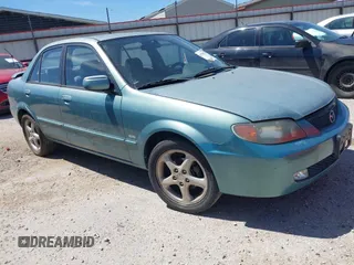 2002 Mazda Protege DX with VIN JM1BJ225420543719, listed as a IAAI auction lot 41778972 with 183,914 mi miles and . Bid and sale history available at DreamBid. Image 1.