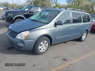 2006 Kia Sedona LX with VIN KNDMB233966090557, listed as a IAAI auction lot 42079046 with 198,851 mi miles. Bid and sale history available at carsss.com. Image 2.