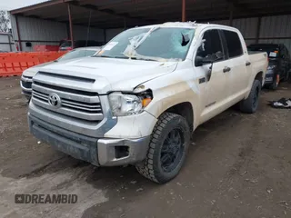 2016 Toyota Tundra 4WD Truck SR5 with VIN 5TFDW5F13GX509045, listed as a IAAI auction lot 41554023 with 165,026 mi miles. Bid and sale history available at carsss.com. Image 2.