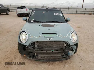2014 MINI Convertible S with VIN WMWZP3C56ET707425, listed as a Copart auction lot 50894965 with 100,116 mi miles and Salvage Title. Bid and sale history available at DreamBid. Image 5.