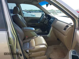 2006 Honda Pilot EX-L with VIN 5FNYF18586B028291, listed as a IAAI auction lot 42040904 with 217,038 mi miles and . Bid and sale history available at carsss.com. Image 5.