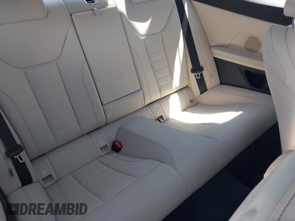 2023 BMW 4 Series 430i xDrive z VIN WBA73AP02PCM47839, wystawiony jako IAAI lot #42011819 z przebiegiem 8 545 mil mil oraz . Historia ofert i sprzedaży dostępna na DreamBid. Obrazek 8.