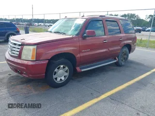 2003 Cadillac Escalade z VIN 1GYEK63N53R183593, wystawiony jako IAAI lot #42438258 z przebiegiem 74 561 mil mil oraz . Historia ofert i sprzedaży dostępna na DreamBid. Obrazek 2.