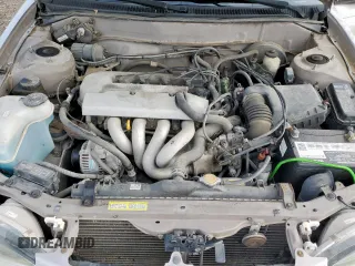 1999 Toyota Corolla VE z VIN 1NXBR12E0XZ215258, wystawiony jako Copart lot #60704095 z przebiegiem Nie podano mil oraz Szkoda całkowita • Salvage title. Historia ofert i sprzedaży dostępna na DreamBid. Obrazek 11.