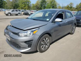 2021 Kia Rio S with VIN 3KPA25AD6ME385851, listed as a Copart auction lot 72138814 with 70,233 mi miles and Salvage Title. Bid and sale history available at DreamBid. Image 1.