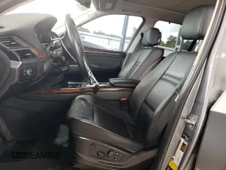 2012 BMW X5 35d with VIN 5UXZW0C53CL671564, listed as a Copart auction lot 60880715 with 154,401 mi miles and Clean title. Bid and sale history available at DreamBid. Image 7.