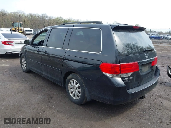 2009 Honda Odyssey EX-L with VIN 5FNRL387X9B051750, listed as a IAAI auction lot 41953221 with 205,142 mi miles. Bid and sale history available at carsss.com. Image 3.